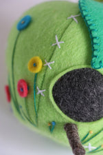 Load image into Gallery viewer, close up of green felt apple shaped pincushion
