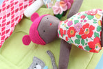 Load image into Gallery viewer, small doll with pink hair and brown fabric skin
