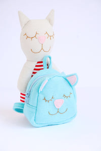 small linen cat shaped toy and blue felt cat backpack