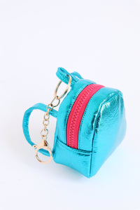 Bright blue vinyl bitty backpack with pink zip